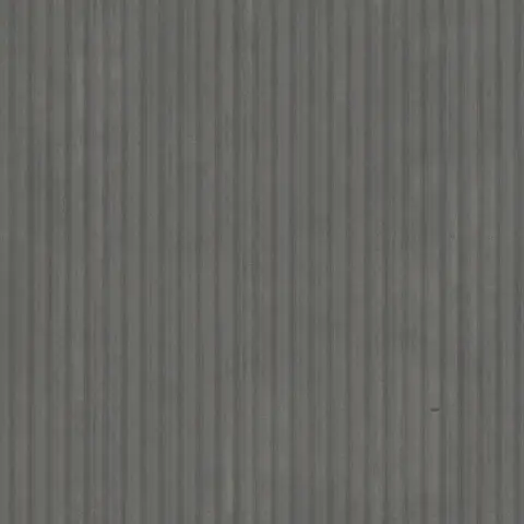 Close photograph of corrugated zinc sheet, grey with a soft sheen.
